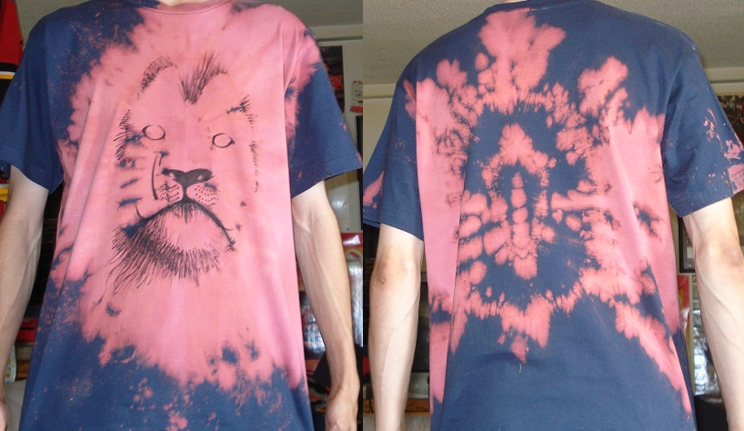 Front and back views of a pink and navy bleach-painted lion shirt