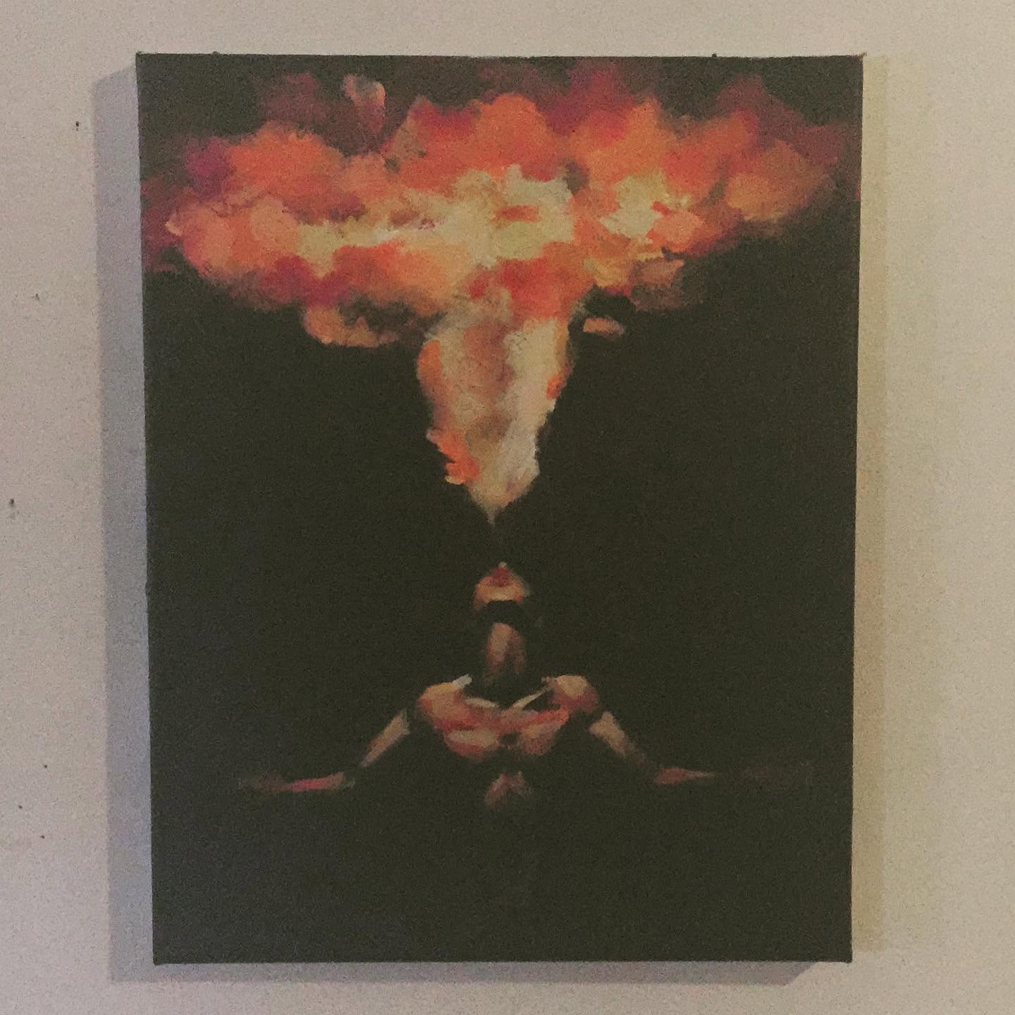 Painting of a figure breathing a stream of fire