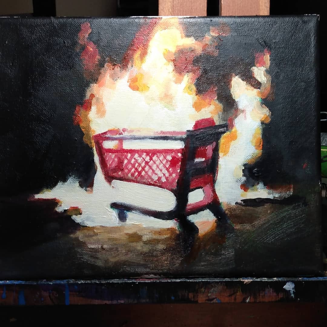 Painting of a shopping cart surrounded by orange flames